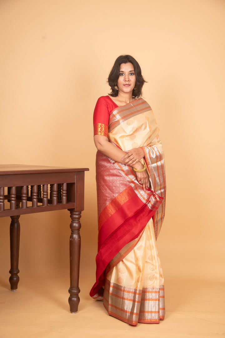 Cream and red kanchi silk saree