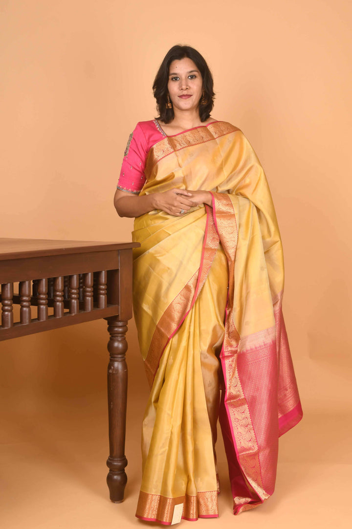 Golden beige and pink pattu saree