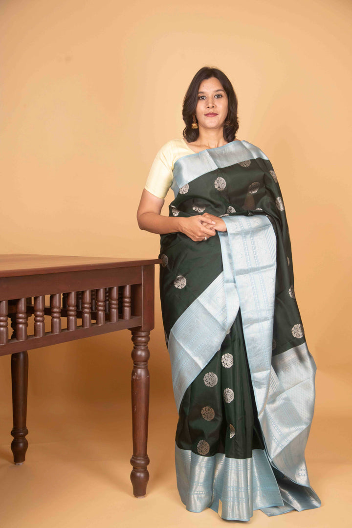 Bottle green and iceblue kanjivaram silk saree