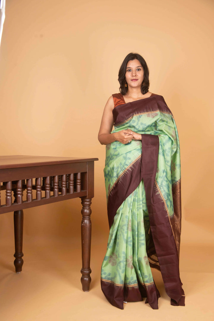 Mint green and bean brown pure silk saree