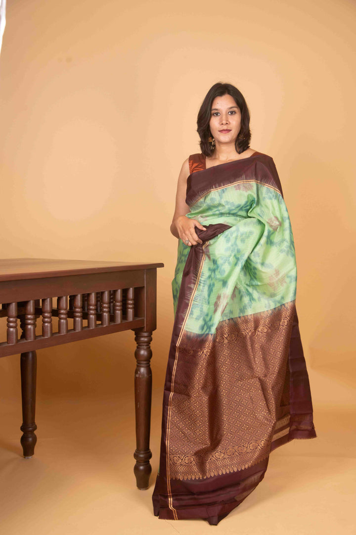 Mint green and bean brown pure silk saree