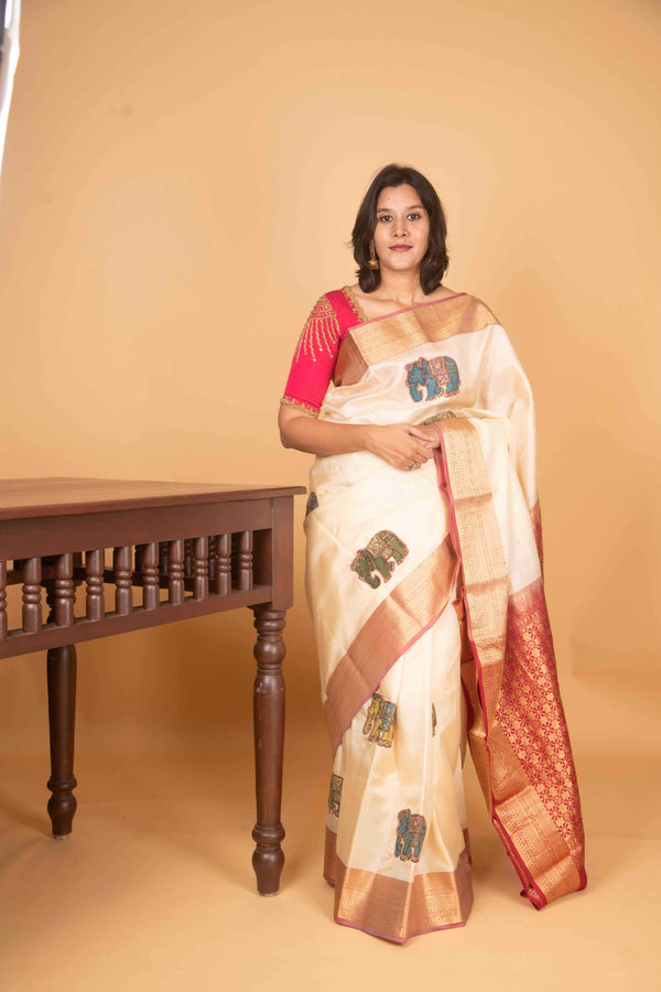 Offwhite and red kalamkari embellished pure kanchi silk saree