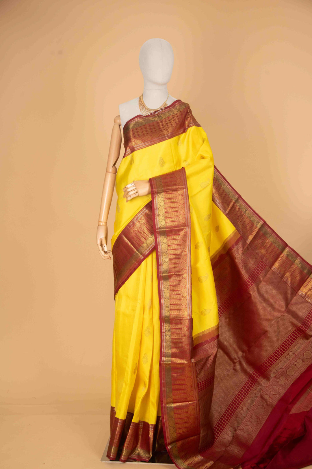 Lemon yellow and red pure zari silk saree
