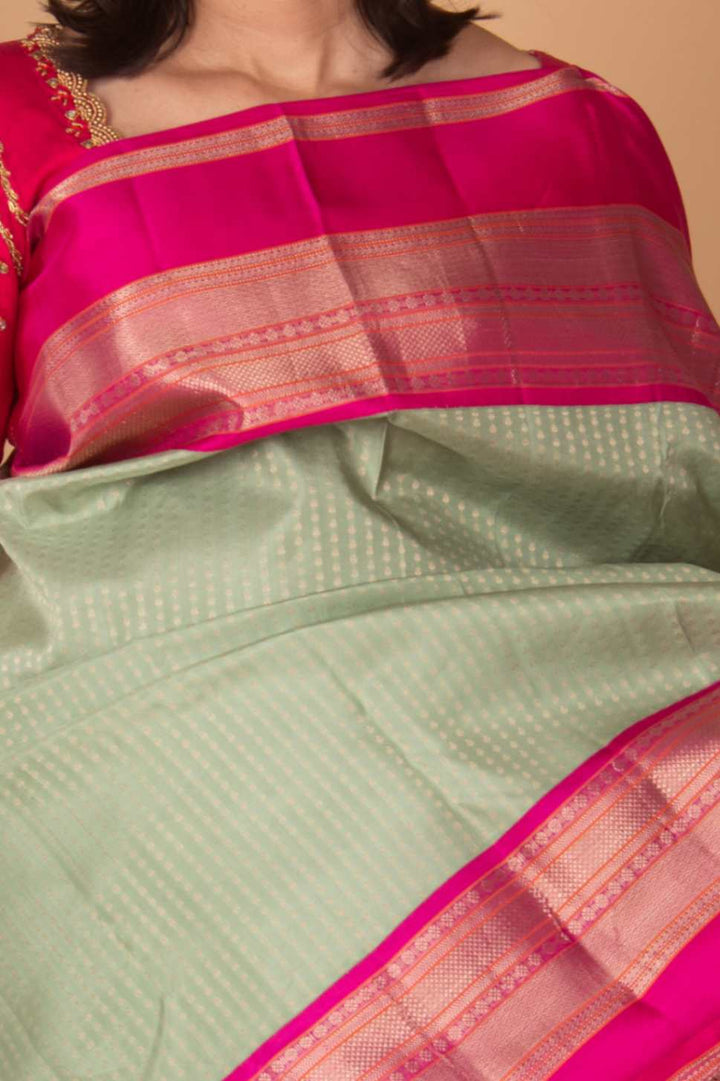 Tea green and pink aayiram butta silk saree