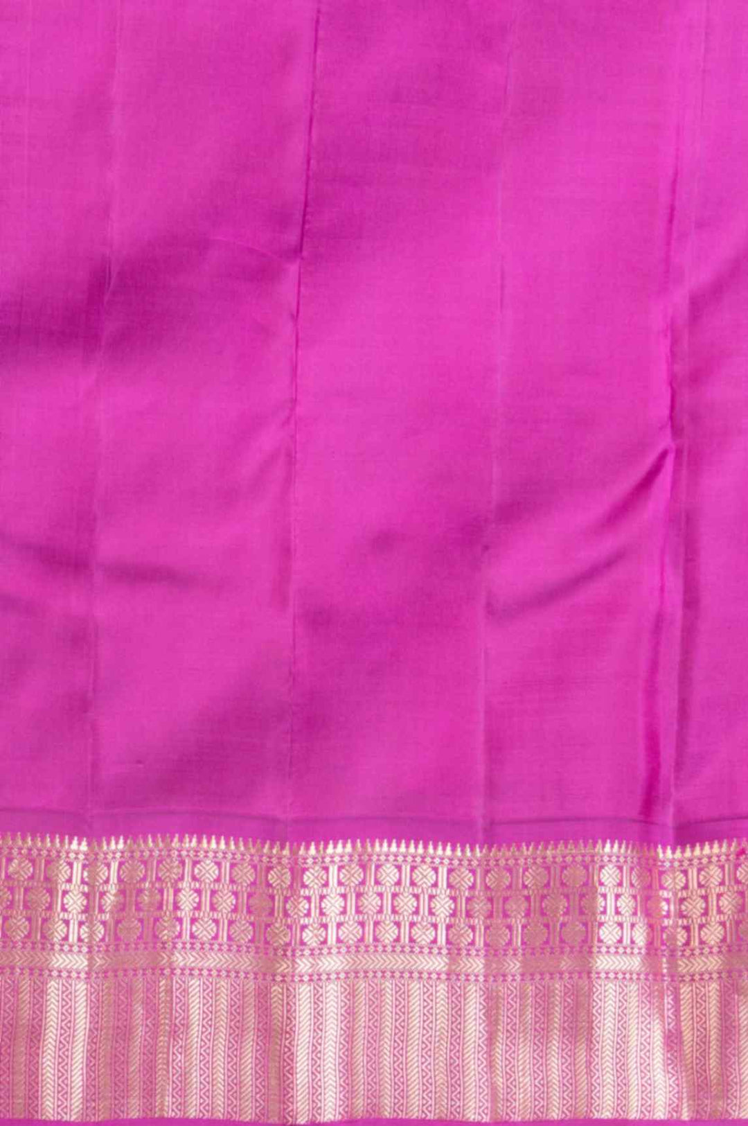 Pine green and magenta silk saree