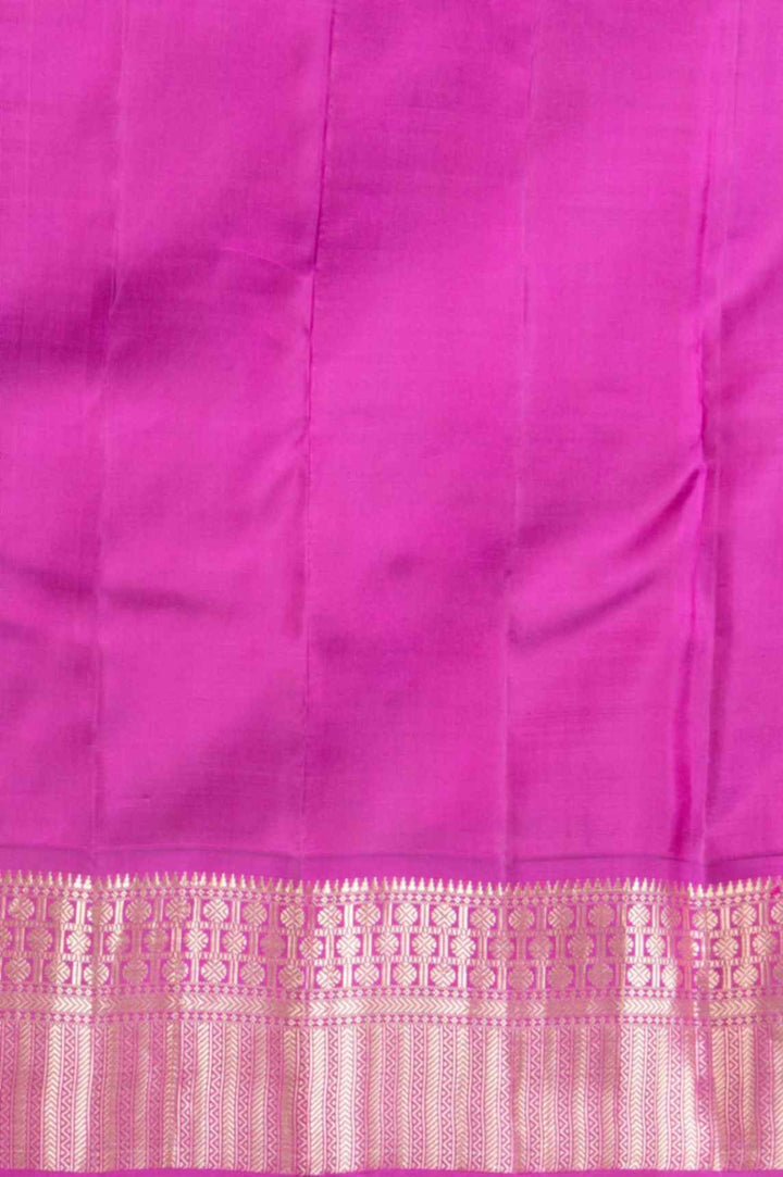 Pine green and magenta silk saree
