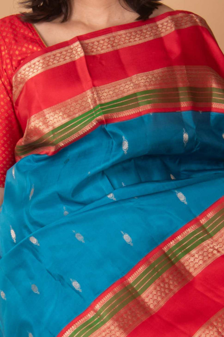 Electric blue and red korvai silk saree
