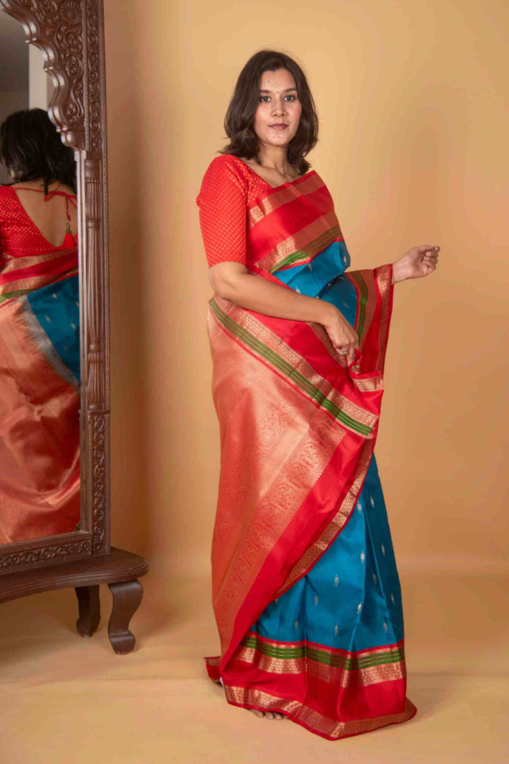 Electric blue and red korvai silk saree