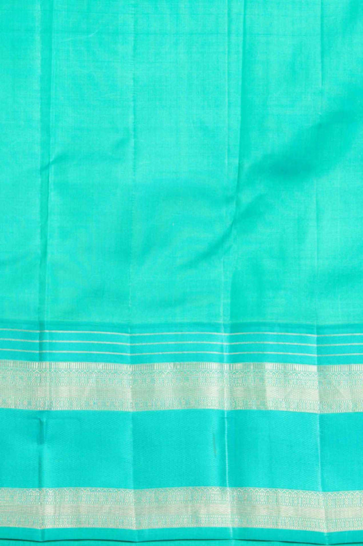 Gold and teal korvai silk saree