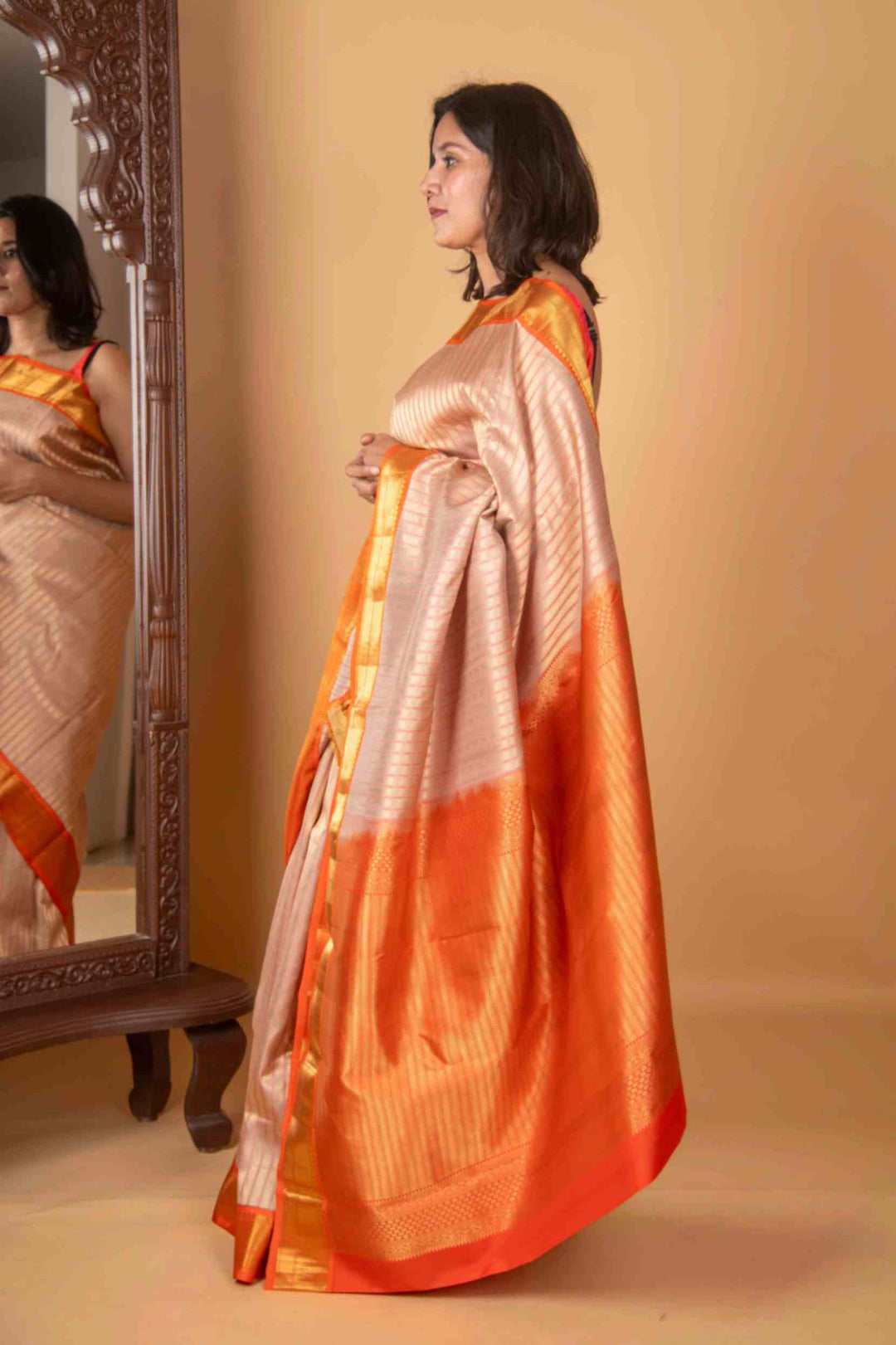 Offwhite and orange silk saree