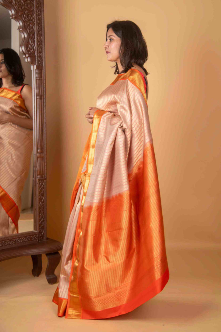 Offwhite and orange silk saree
