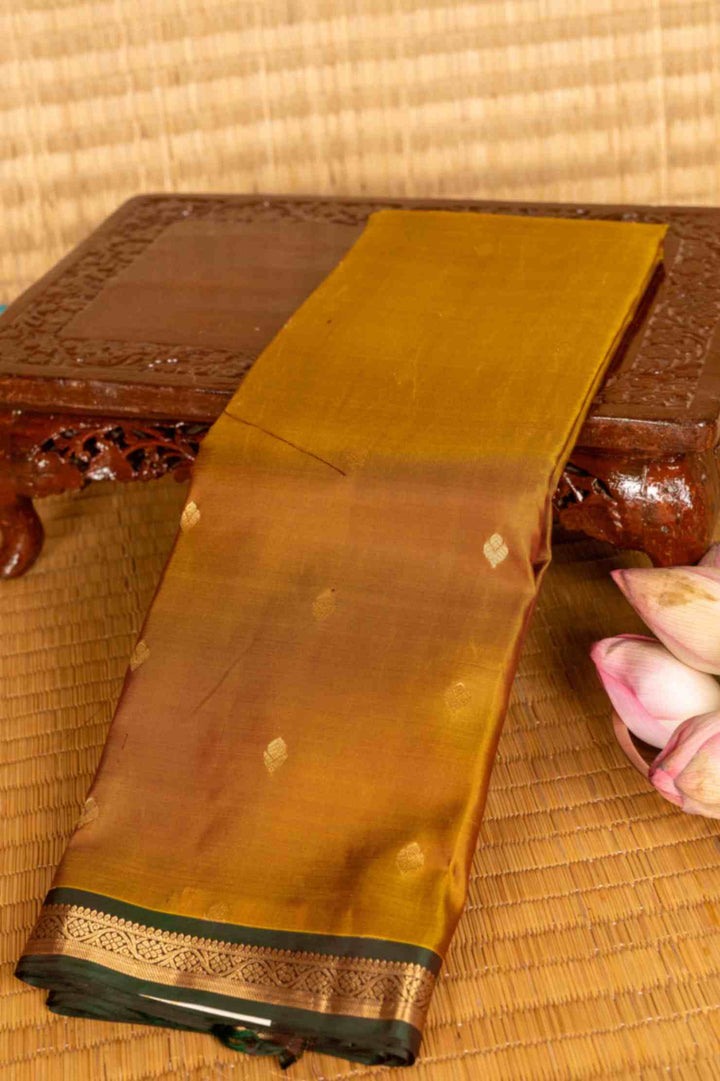 Golden honey and green silk saree