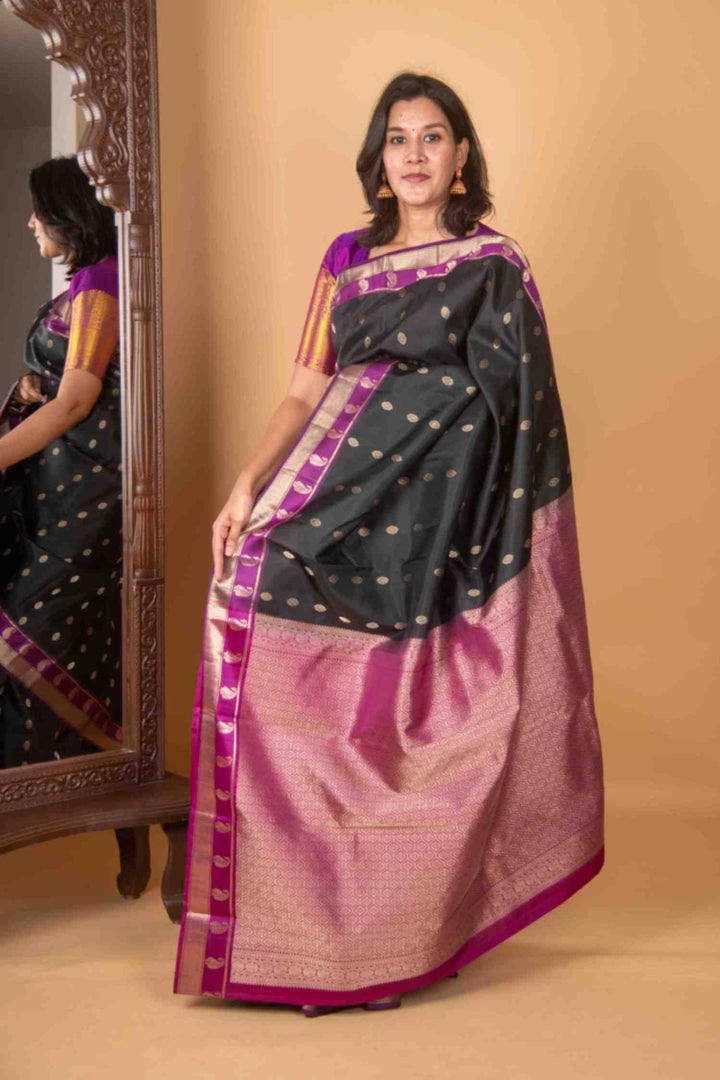 Black and paisley silk saree