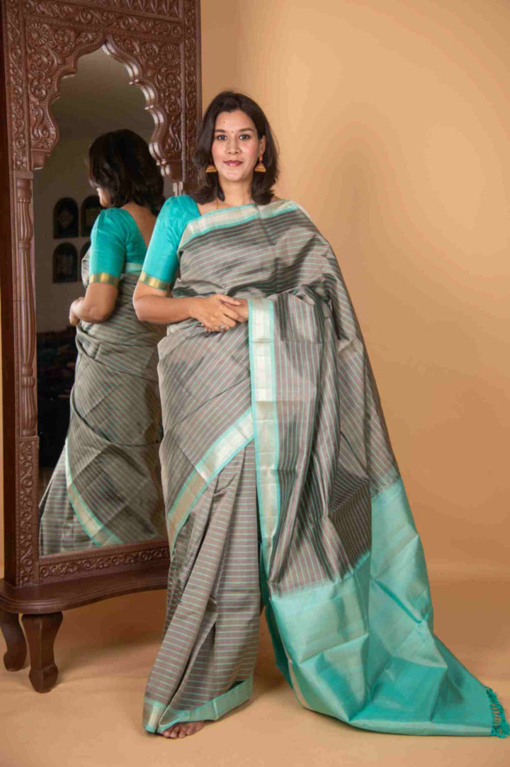 Slate grey and turquoise silk saree