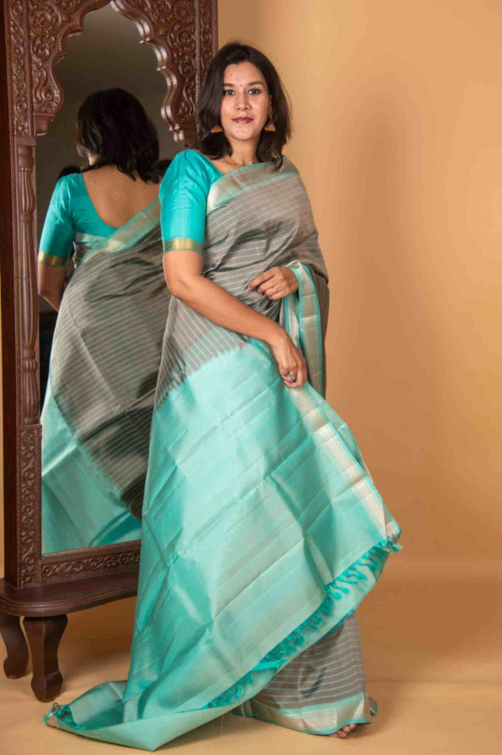 Slate grey and turquoise silk saree