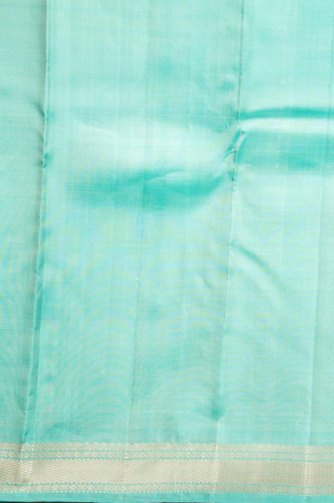 Slate grey and turquoise silk saree