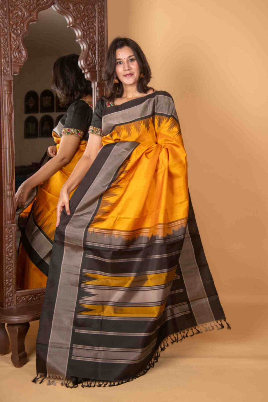 Yellow and black zero zari silk saree
