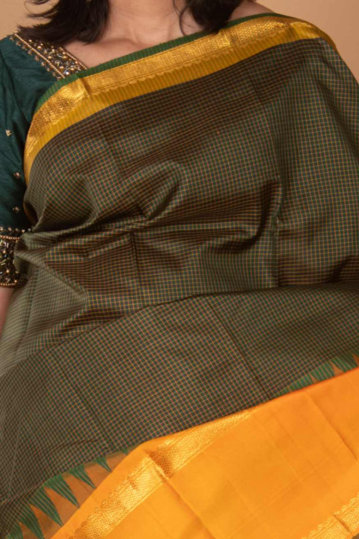 Green and mustard korvai silk saree