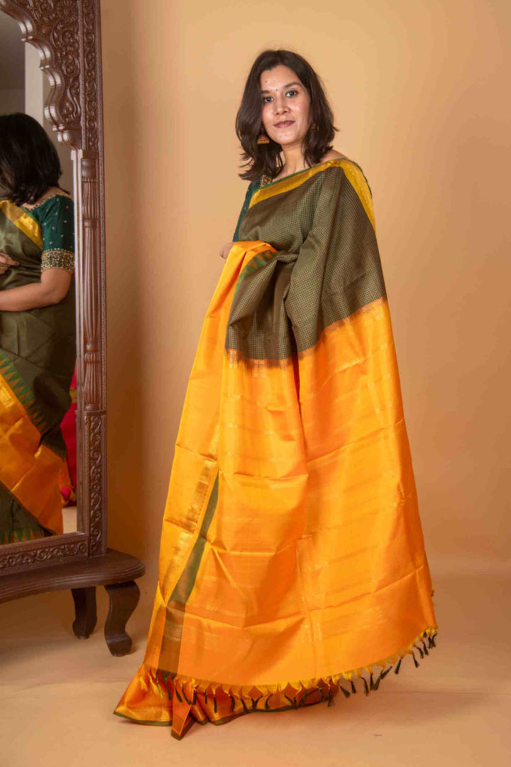 Green and mustard korvai silk saree