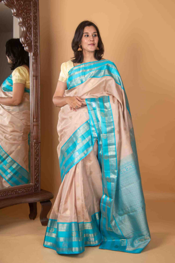 OffWhite and Anandha Blue Vairaoosi Silk Saree
