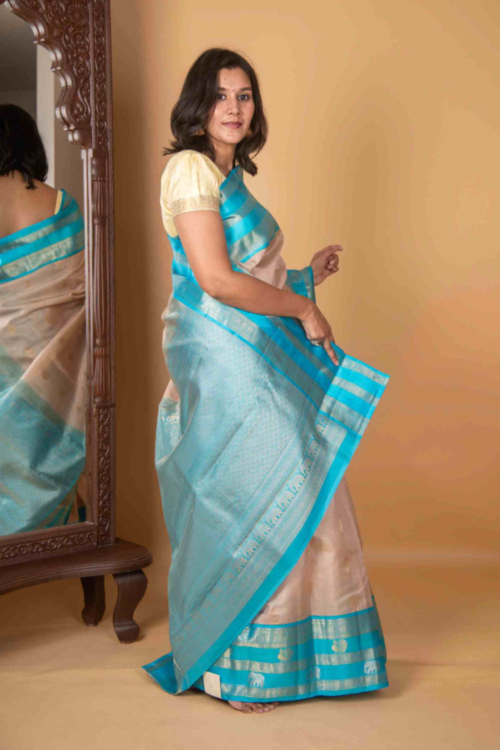 OffWhite and Anandha Blue Vairaoosi Silk Saree