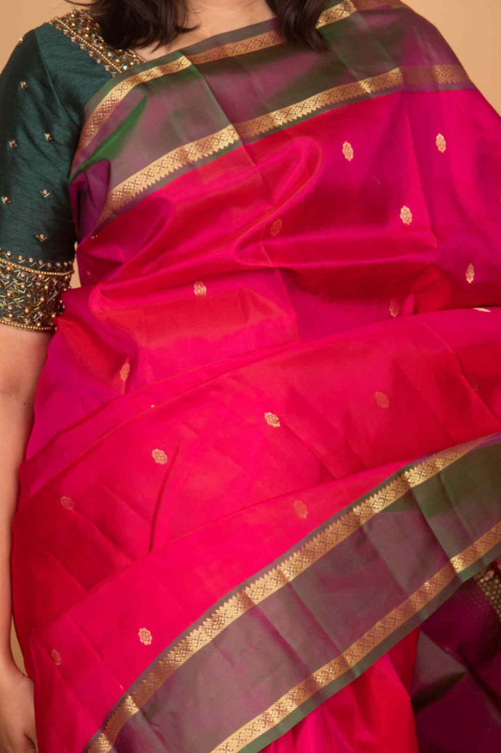 Budrose pink and manthulir green retta pettu silk saree