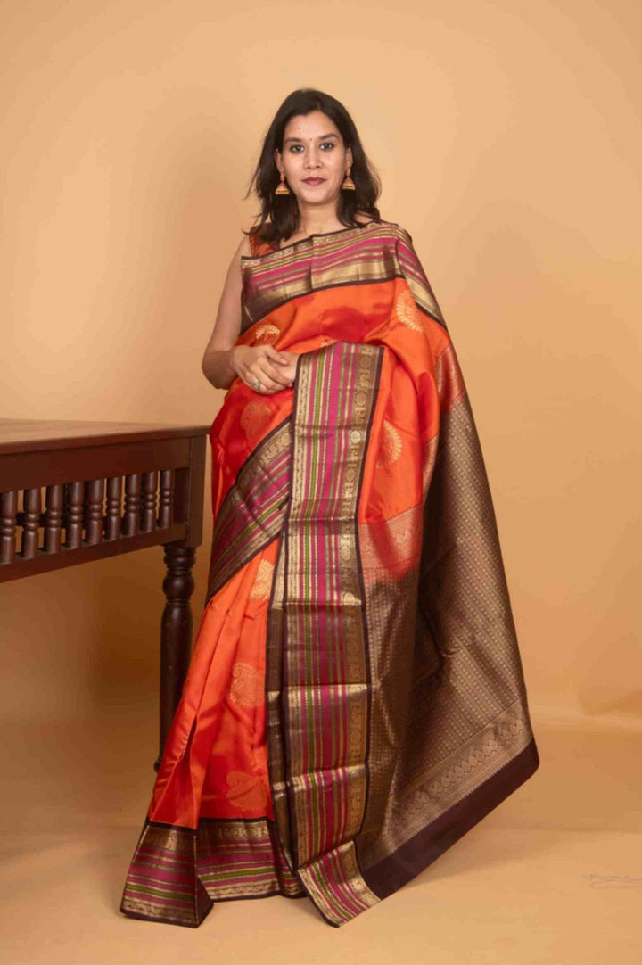 Tiger orange and bean brown korvai silk saree