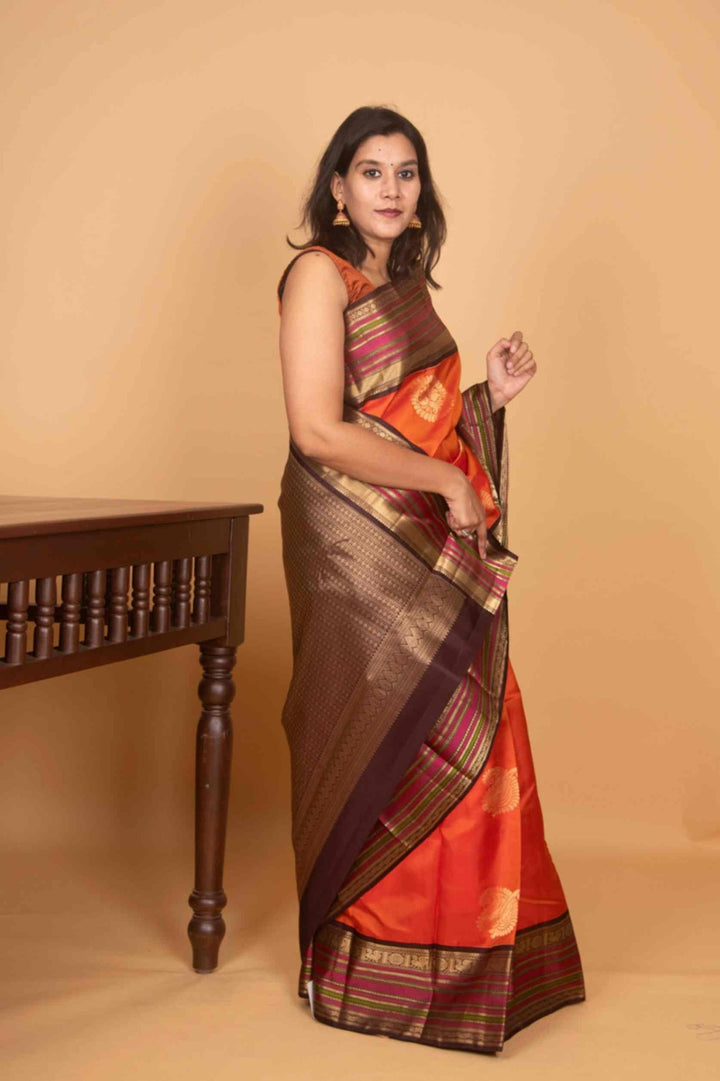 Tiger orange and bean brown korvai silk saree