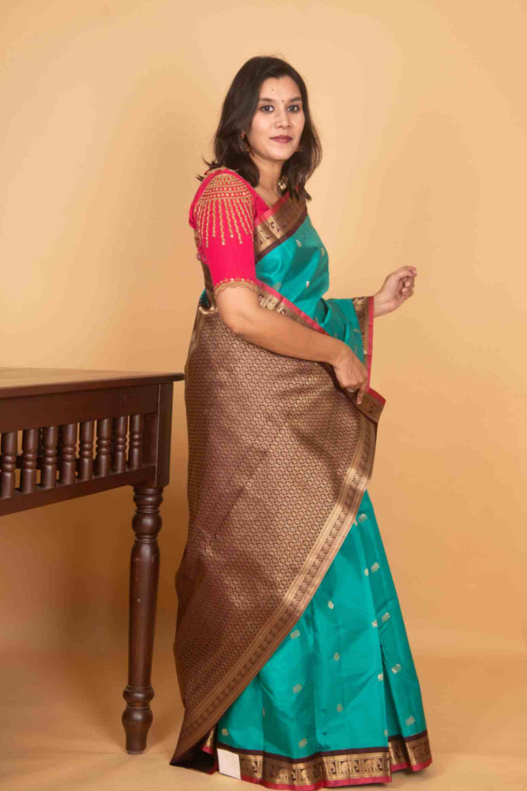 Aqua marine green and brown small border korvai silk saree