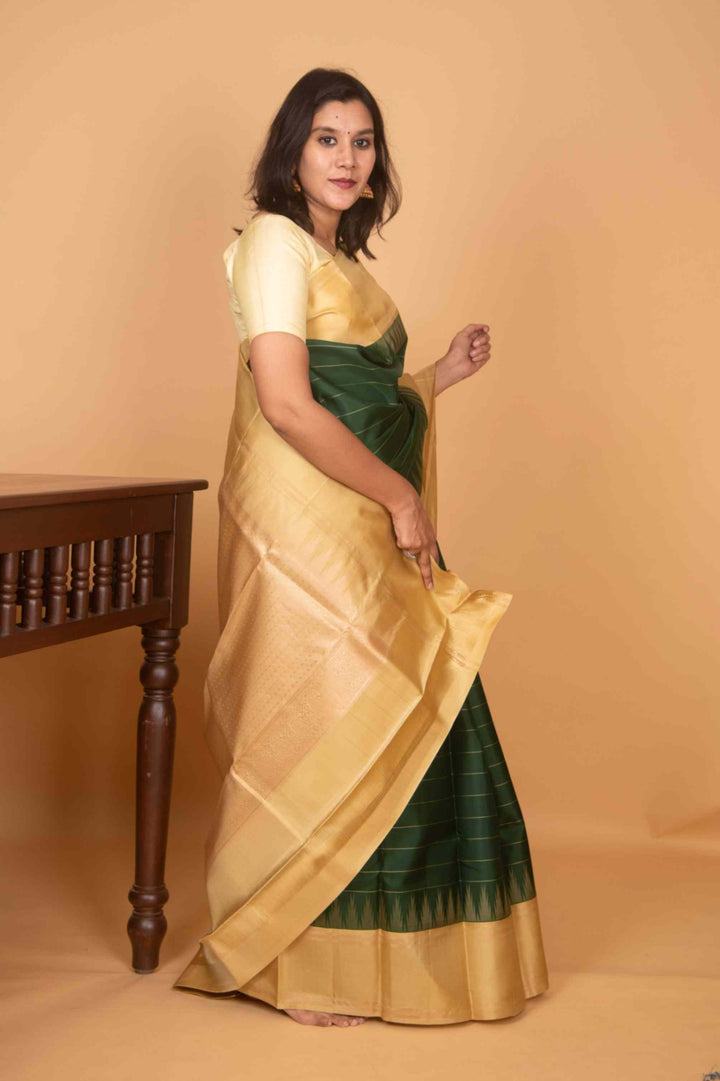 Moss green and sage green temple border silk saree