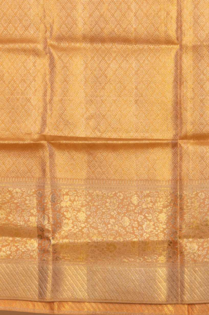 Peachish gold tissue silk saree