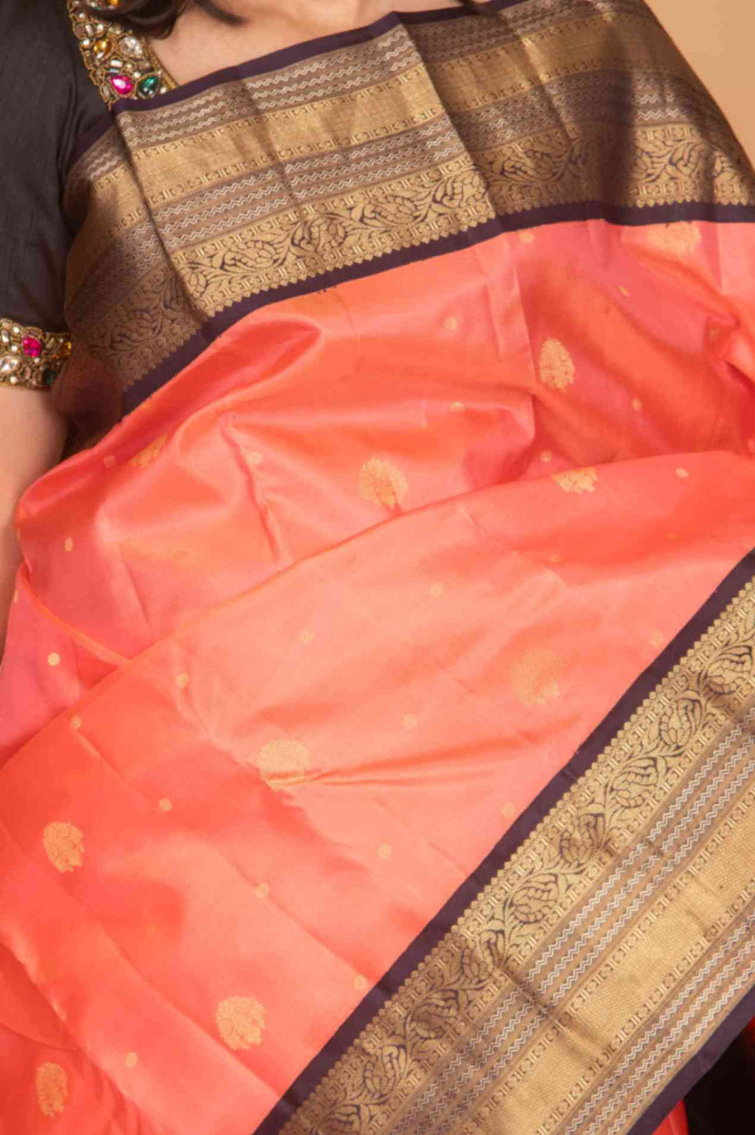 Peach and black korvai silk saree