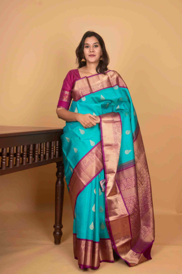 Aqua blue and purple korvai silk saree