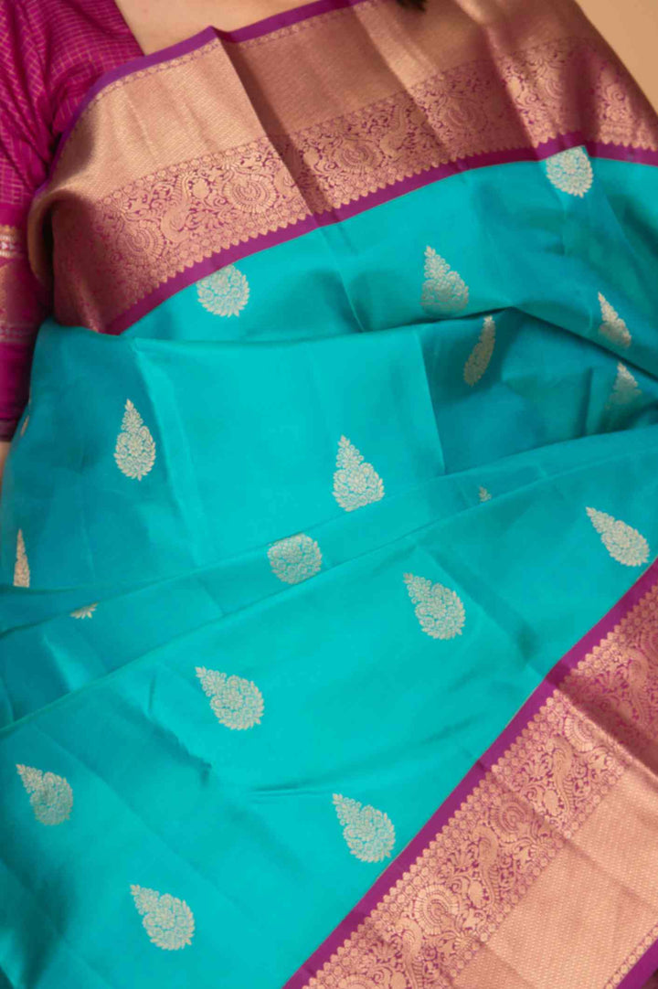 Aqua blue and purple korvai silk saree