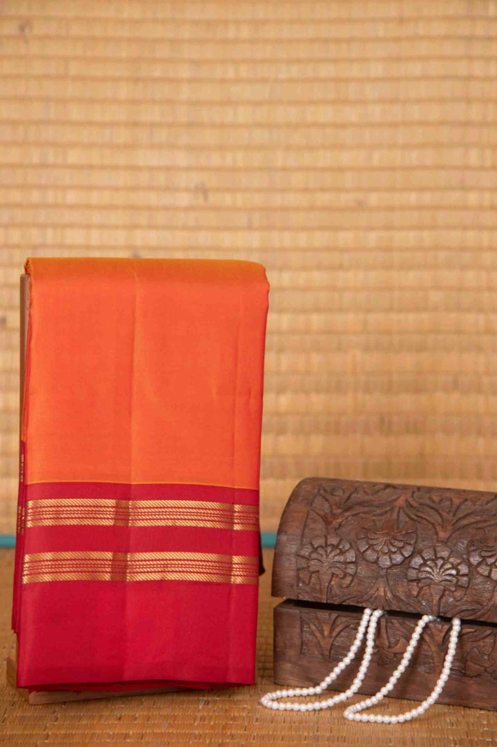 Dual tone orange and red pure silk saree