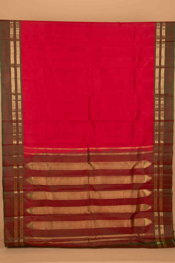 Tomato red and mandhulir green pure silk saree