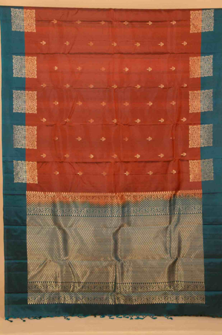 Rust and teal pure silk saree