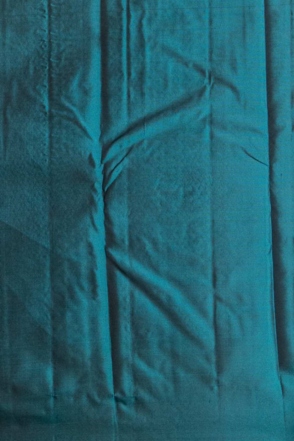 Rust and teal pure silk saree
