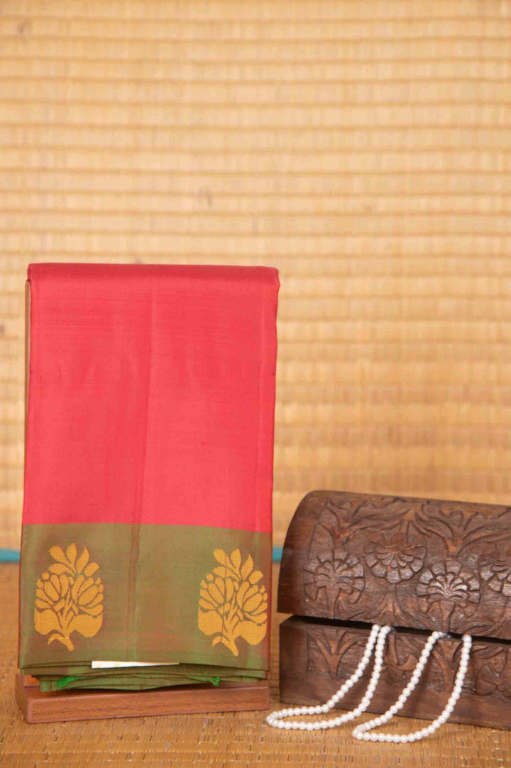 Tomato red and mandhulir green zero zari silk saree