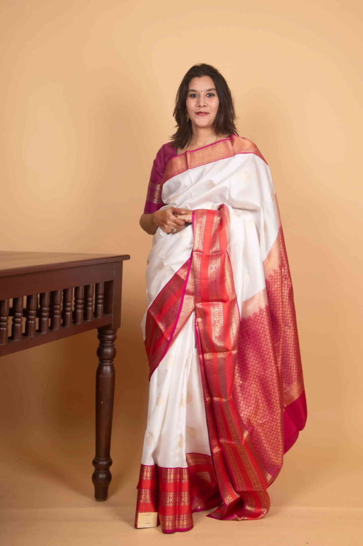 Pearl white and magenta korvai pure silk saree
