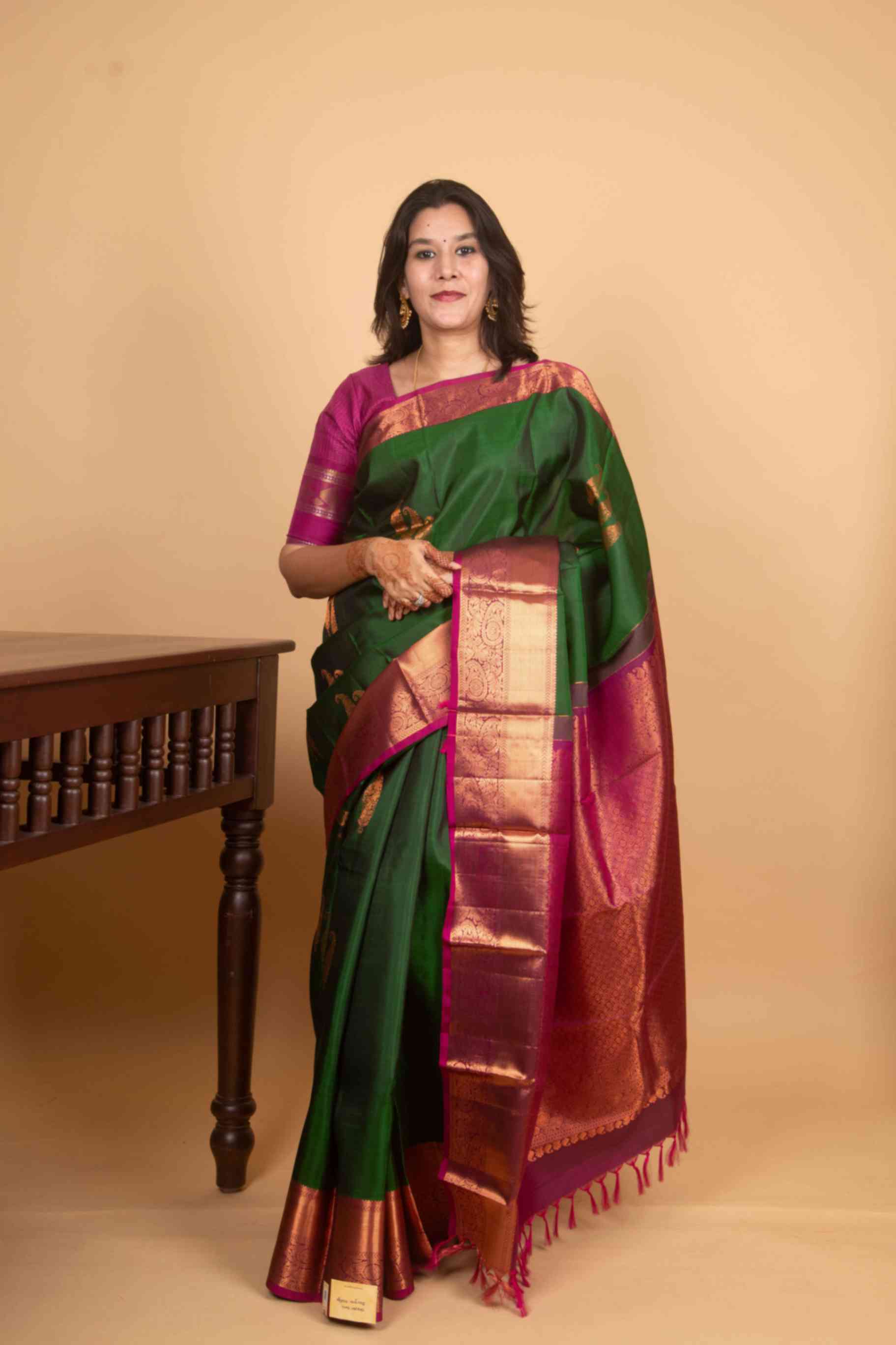 Green and magenta pure silk saree