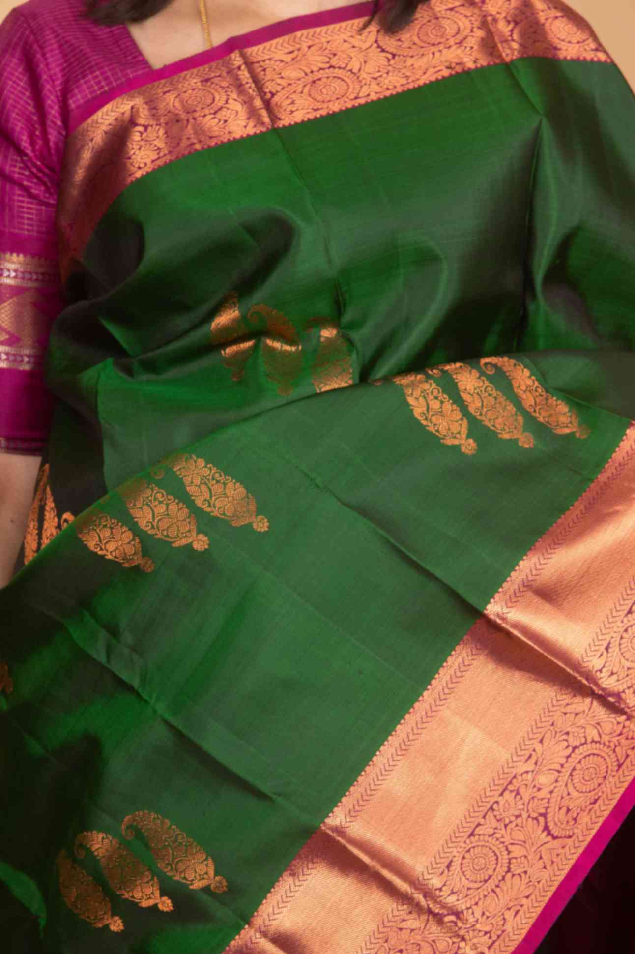 Green and magenta pure silk saree
