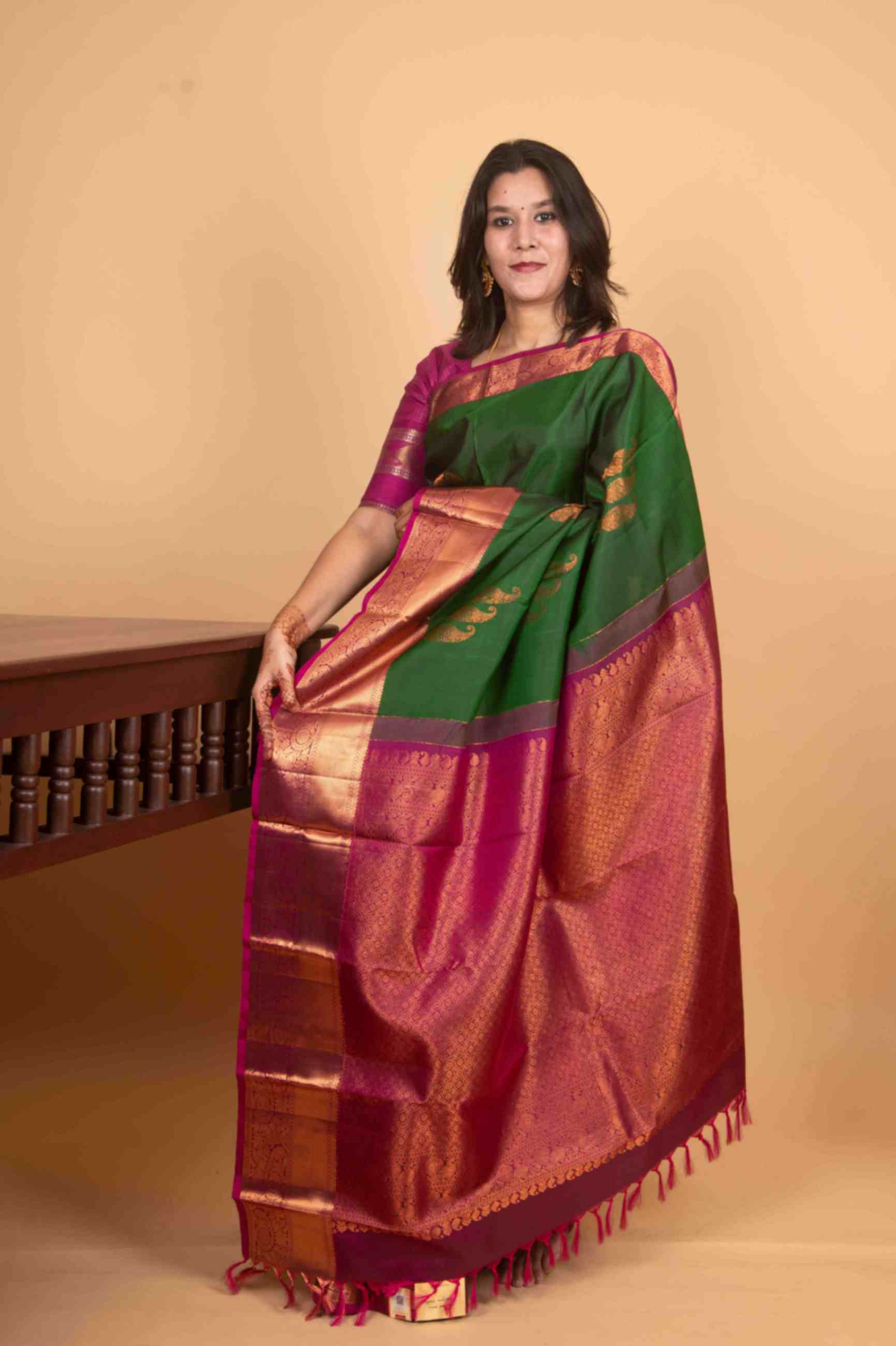 Green and magenta pure silk saree
