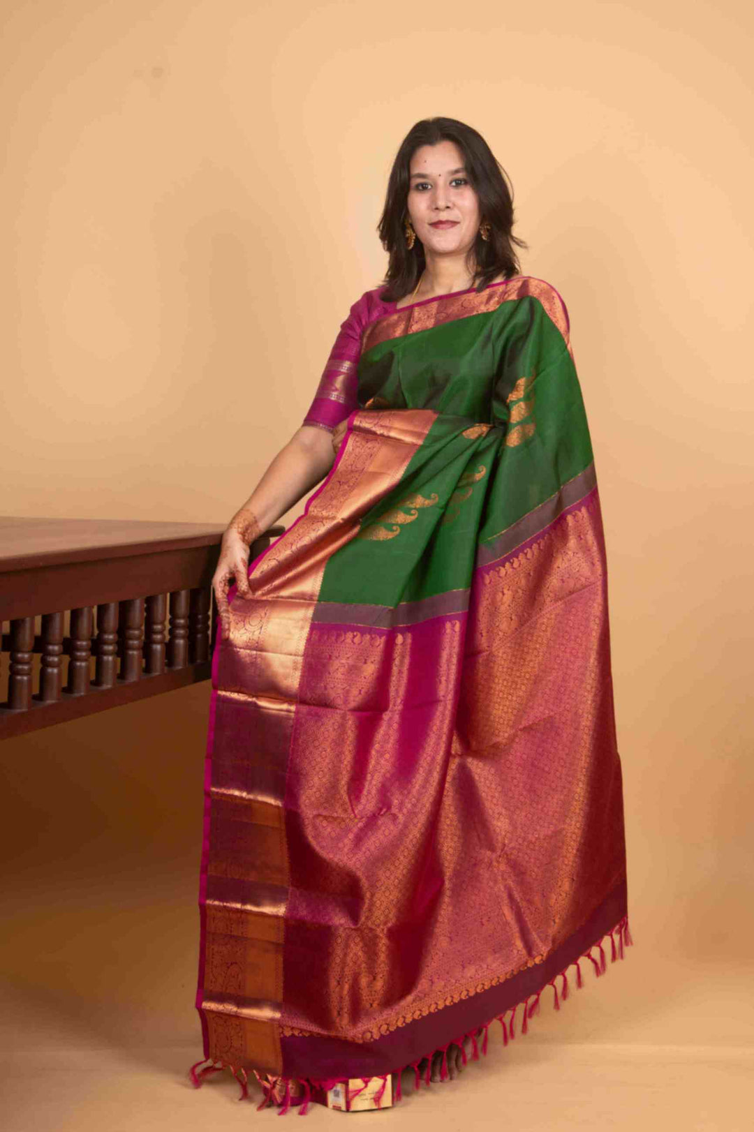 Green and magenta pure silk saree
