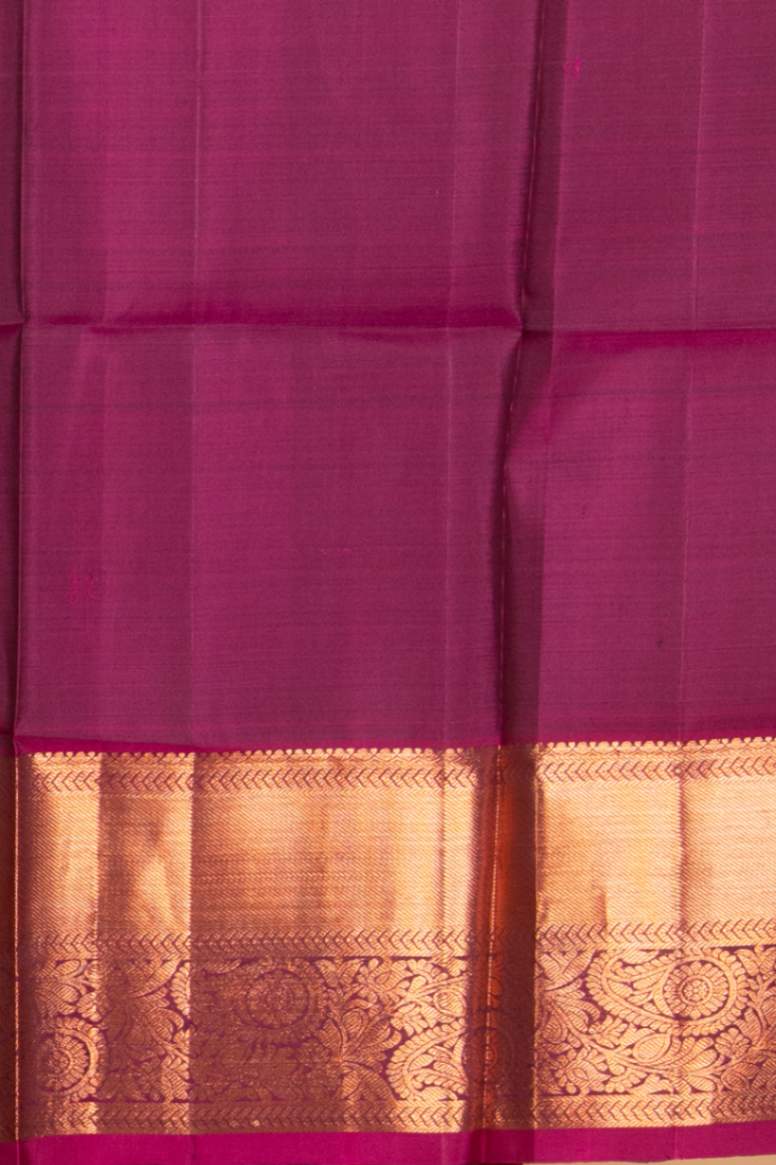 Green and magenta pure silk saree