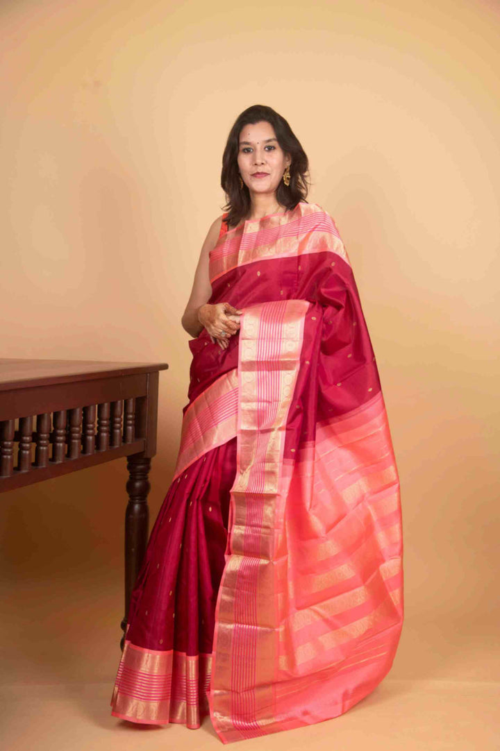 Carmine and peach korvai silk saree