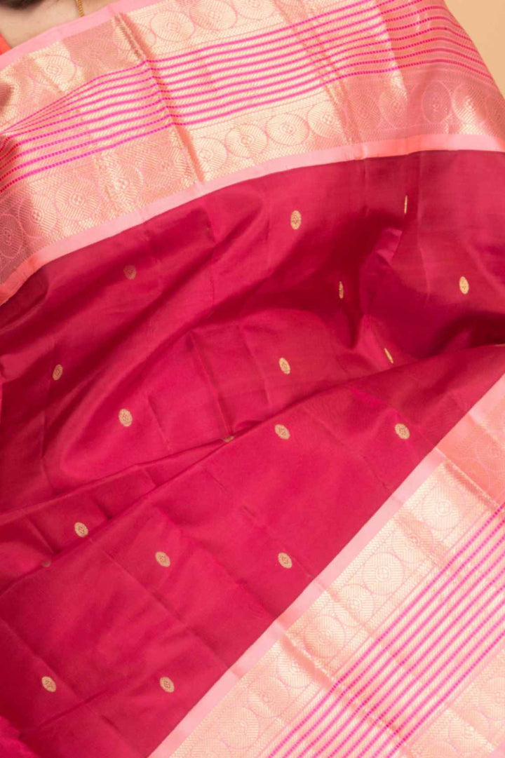 Carmine and peach korvai silk saree