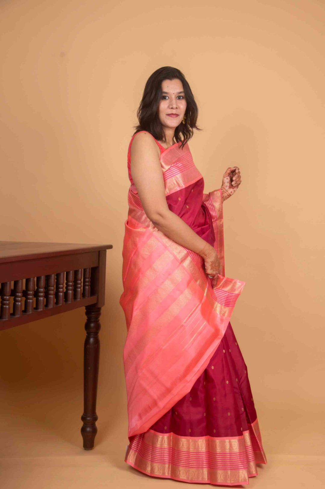 Carmine and peach korvai silk saree