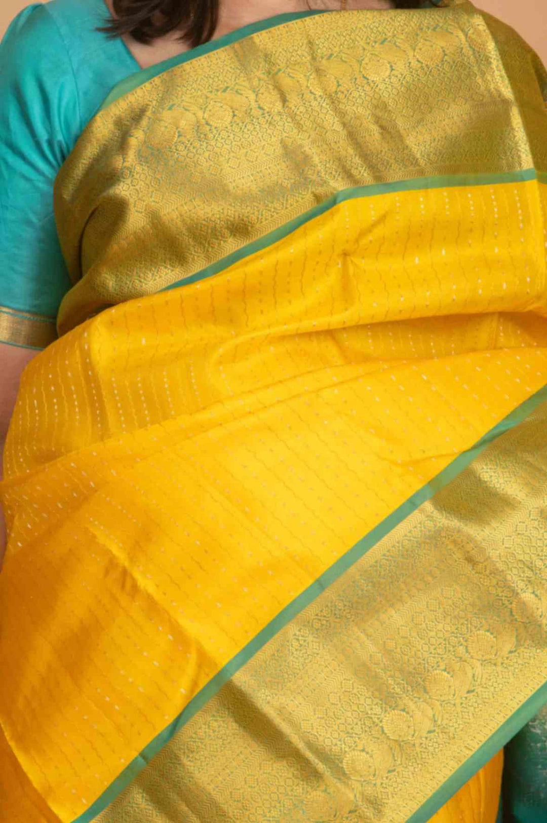 Yellow and teal silk saree