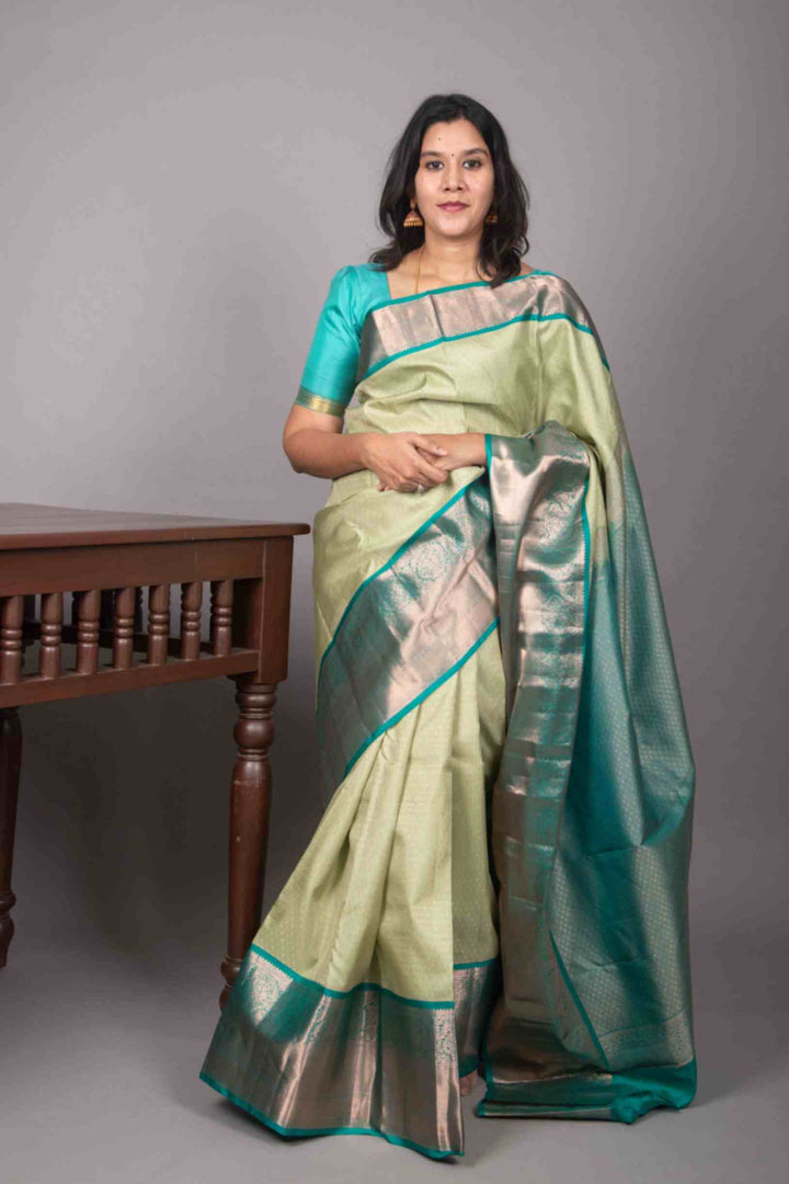 Sage green and teal green korvai silk saree
